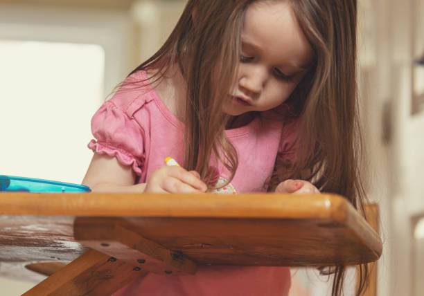 istock Girl Enjoys Colouring 1225102557