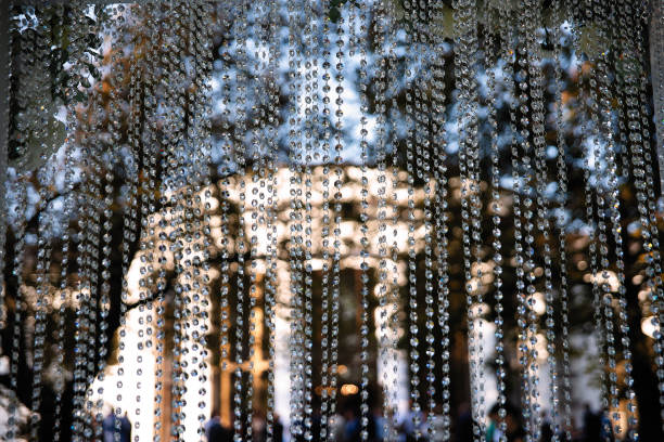 through the bead jewelry the building is visible