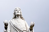 Old staue of Jesus Christ, background with copy space
