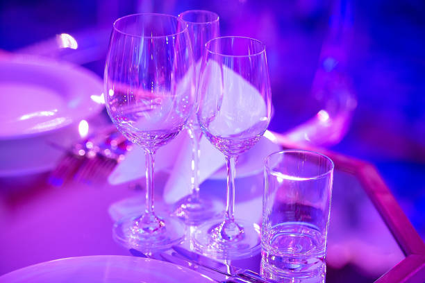 istock in pink light are glasses on the table, beautiful festive table setting 1225107729