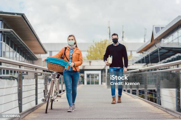 Students On University Campus Wearing Masks During Coronavirus Crisis Stock Photo - Download Image Now