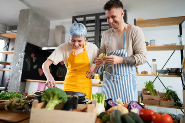 istock Vegan couple cooking at their kitchen 1225108646