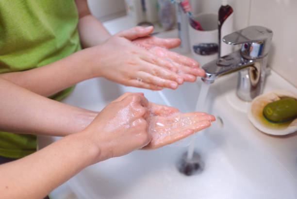 istock Family washing their hands with great care 1225109600