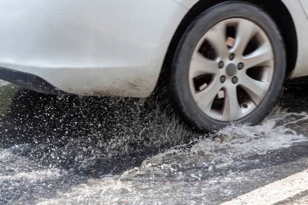 istock tire splashing in water 1225109644