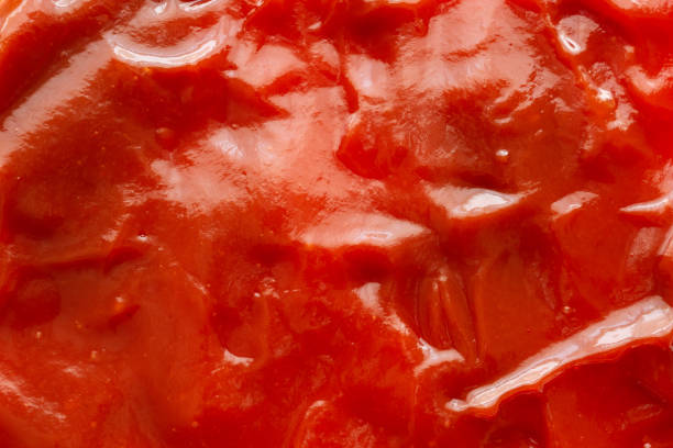 istock Tomato sauce ketchup texture background close up 1225115558