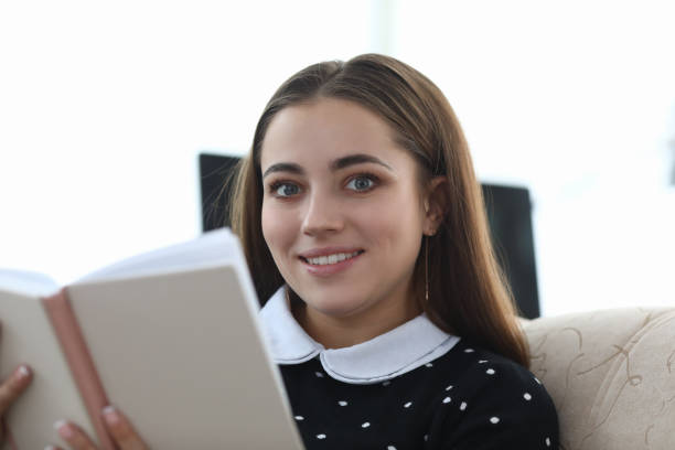 istock Good-looking female on couch 1225115583
