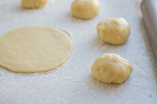 istock Step-by-step instructions for making bagel cookies for use in recipe illustrations. Balls of dough, blanks. step 2 1225116529