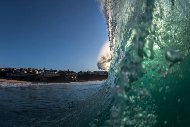 istock Splashing waves at sunrise 1225128225