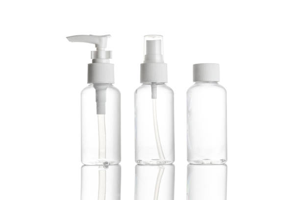 istock Sanitizer bottle. Empty clear plastic pump container for antiseptic gel, cosmetic soap and mineral shampoo isolated on white. Water cap blank spray on transparent background. 1225130891