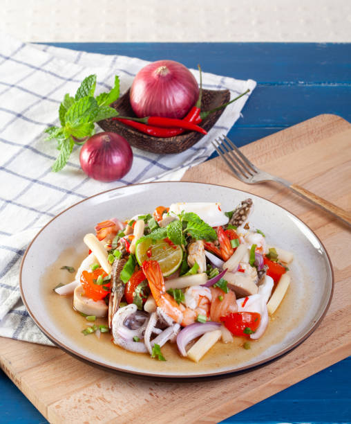 istock Spicy seafood salad with Thai vegetables 1225131813