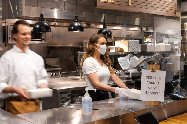 istock Purchasing takeout from a COVID safe business 1225137072