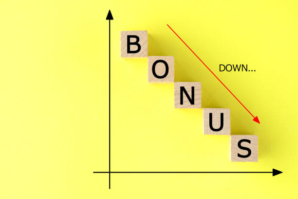 istock Descending Income images on yellow background 1225139197