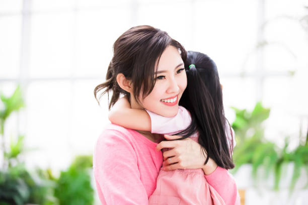 istock Mom hug daughter in her arm 1225143500