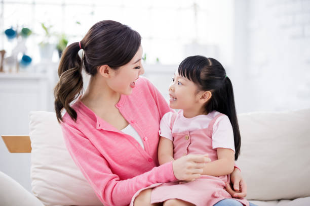 istock Mom hold daughter in her arm 1225143524