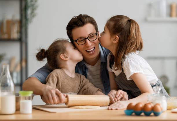 istock family are preparing bakery together 1225150209