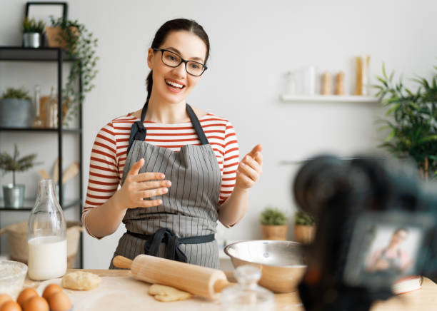 istock woman is recording vlog about cooking. 1225150289