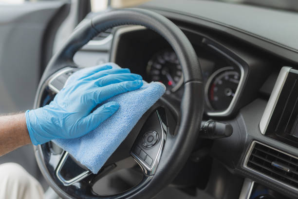 istock Man cleaning car with microfiber cloth 1225150693