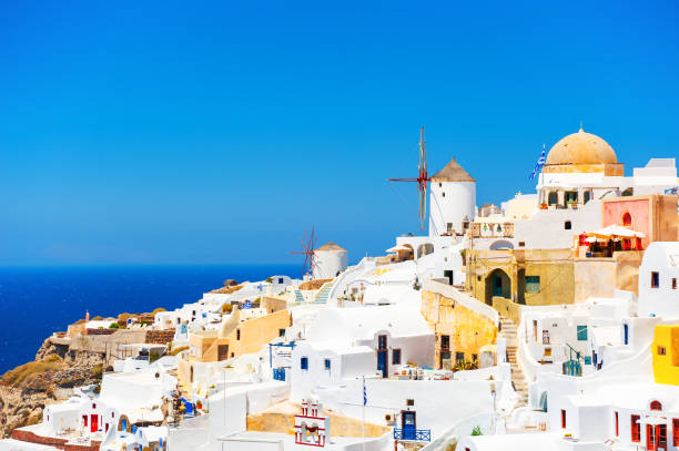 istock White architecture in Oia town on Santorini island, Greece. 1225153441
