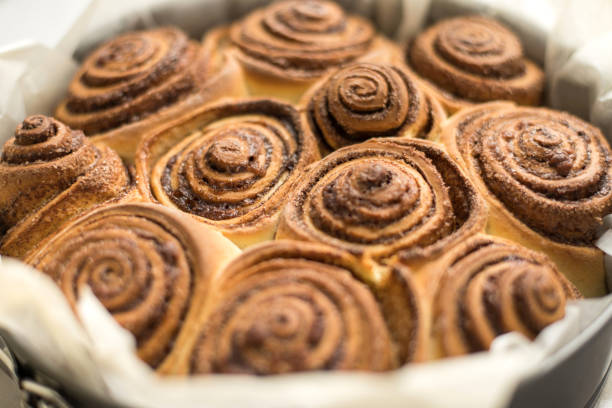 istock Fresh rolls Cinnabon, Cinnamon rolls in the form. Flavorful pastries 1225154499