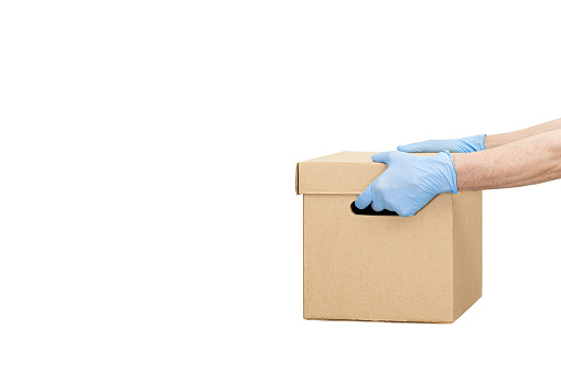 Delivery Man Holding Cardboard Boxes In Rubber Gloves Isolated