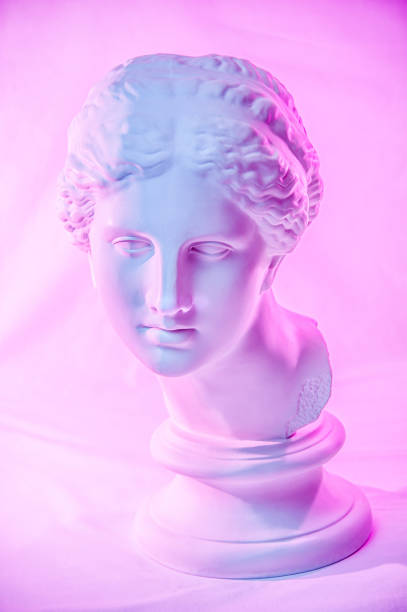 istock Statue of Venus de Milo. Creative concept colorful neon image with ancient greek sculpture Venus or Aphrodite head. Webpunk, vaporwave and surreal art style. Pink and blue duotone effects. 1225155991