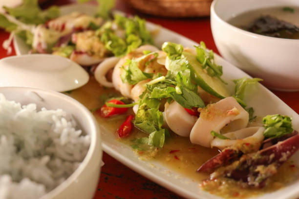 istock Steamed squid with spicy chilli and lemon sauce. 1225156863