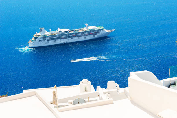 Santorini island, Greece - August 2, 2017: Cruise ship near Santorini island, Greece. Beautiful sea view. Famous travel destination