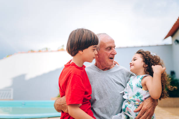 Grandfather spending time with grandchildren