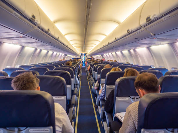istock Saloon aircraft with passengers during the flight 1225165344