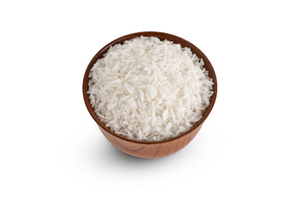istock clipping path rice in wood bowl on isolated white background 1225169842