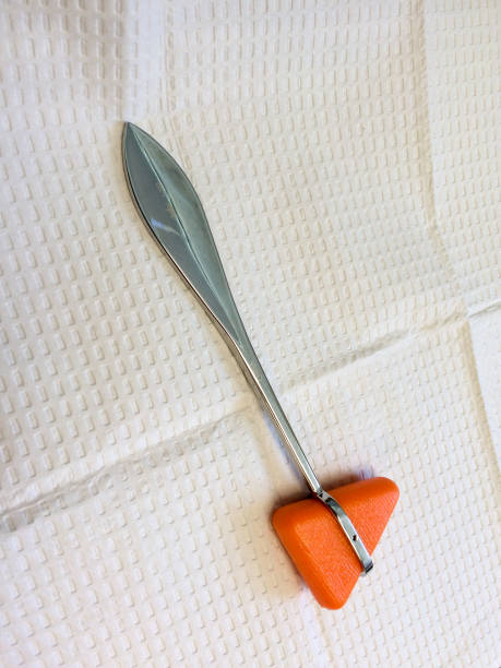 istock Reflex hammer at doctor office on white background 1225171228