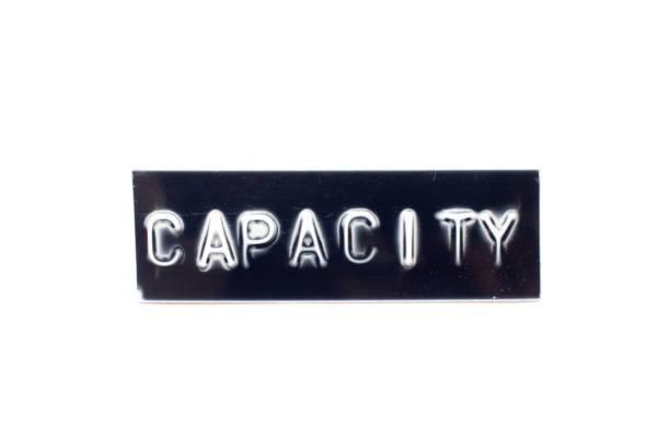 istock Embossed letter in word capacity in black banner on white background 1225171400