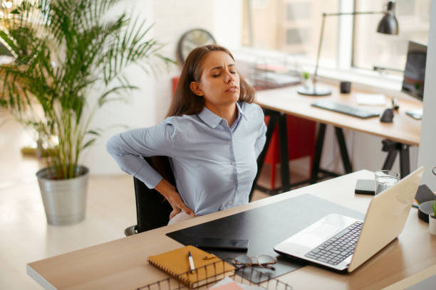 istock Tired businesswoman working in office. 1225172684