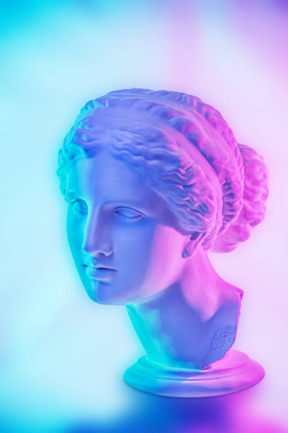 istock Statue of Venus de Milo. Creative concept colorful neon image with ancient greek sculpture Venus or Aphrodite head. Webpunk, vaporwave and surreal art style. Pink and blue duotone effects. 1225174901