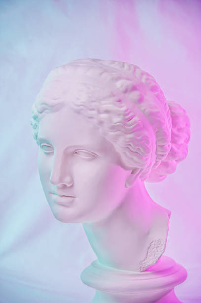 istock Statue of Venus de Milo. Creative concept colorful neon image with ancient greek sculpture Venus or Aphrodite head. Webpunk, vaporwave and surreal art style. Pink and blue duotone effects. 1225174940