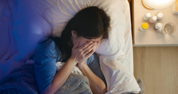 istock woman was sad on bed 1225176605