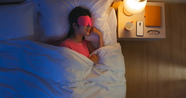 istock woman sleeping well in bed 1225176614