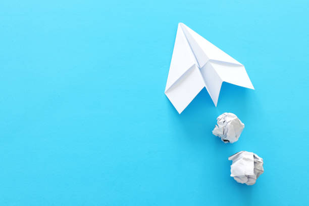 istock education or innovation concept. paper origami plane over blue background 1225177597