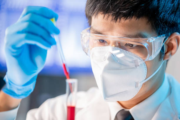 istock medical worker take test tube 1225177676