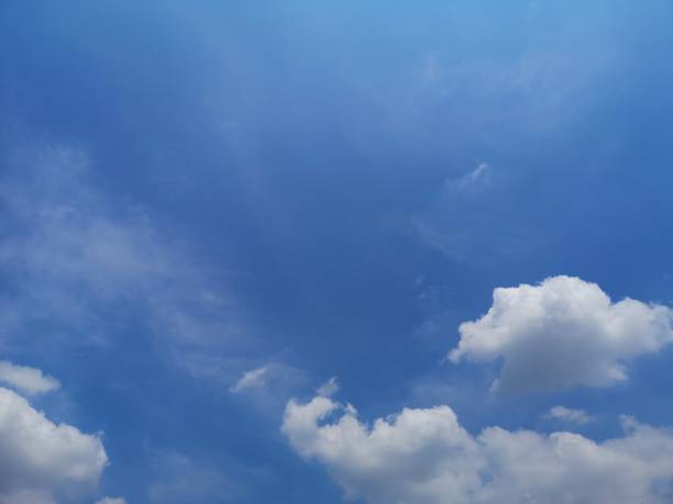 istock white clouds in the blue sky natural background beautiful nature space for write 1225179906