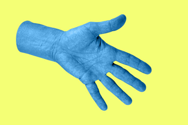 istock Hand in a pop art collage style in neon bold colors. Modern psychedelic creative element with human palm for posters, banners, wallpaper. Copy space for text. Magazine style template. Zine culture. 1225180955