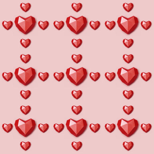 istock Seamless pattern with red polygonal paper heart on pink background. Wallpaper for Valentines Day. Love concept. Bright colors. Minimal style. 1225184809