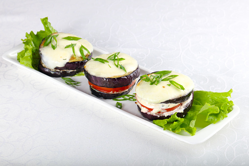 Baked eggplant with tomato and cheese