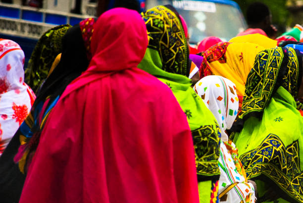 istock Zanzibar: women waiting at bus stop. 1225186153