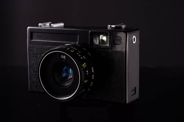 istock Old film camera. Isolate of a black Soviet camera. 1225189884