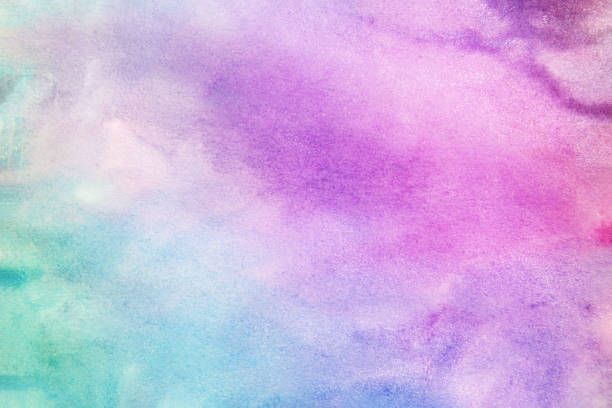 istock spreading multicolored watercolors pink, blue and green on canvas 1225194030
