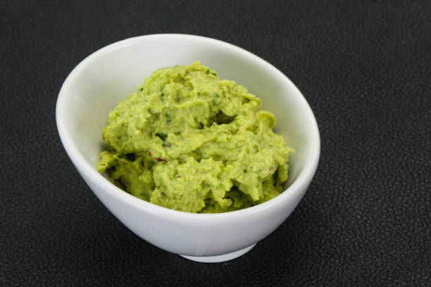istock Avocado guacamole sauce with chili pepper 1225196183