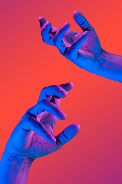 istock Two hand in a pop art collage style in neon bold colors. Modern psychedelic creative element with human palm for posters, banners, wallpaper. Copy space for text. Magazine style. Zine culture. 1225201244