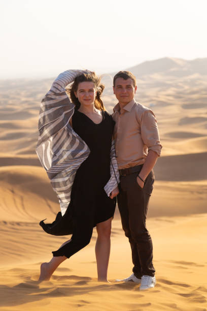 istock Newlyweds on a honeymoon in the desert. 1225204527