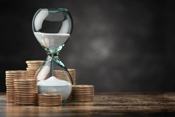 golden coins and hourglass clock. return on investment, deposit, growth of income and savings, time is money concept. - time and money imagens e fotografias de stock